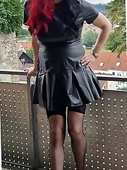 A flexible girl in men s clothes has fun with a cock